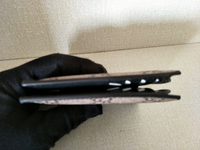 G*u*i with plaid bee wallets